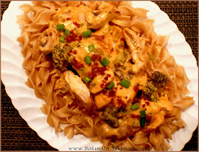 Crockpot Creamy Chicken, an easy hearty comfort food. Mix the sauce, add the chicken, cook in just 4 hours in the crockpot. Serve over wide noodles for a full dinner. | Recipe developed by www.BakingInATornado.com | #recipe #crockpot #dinner