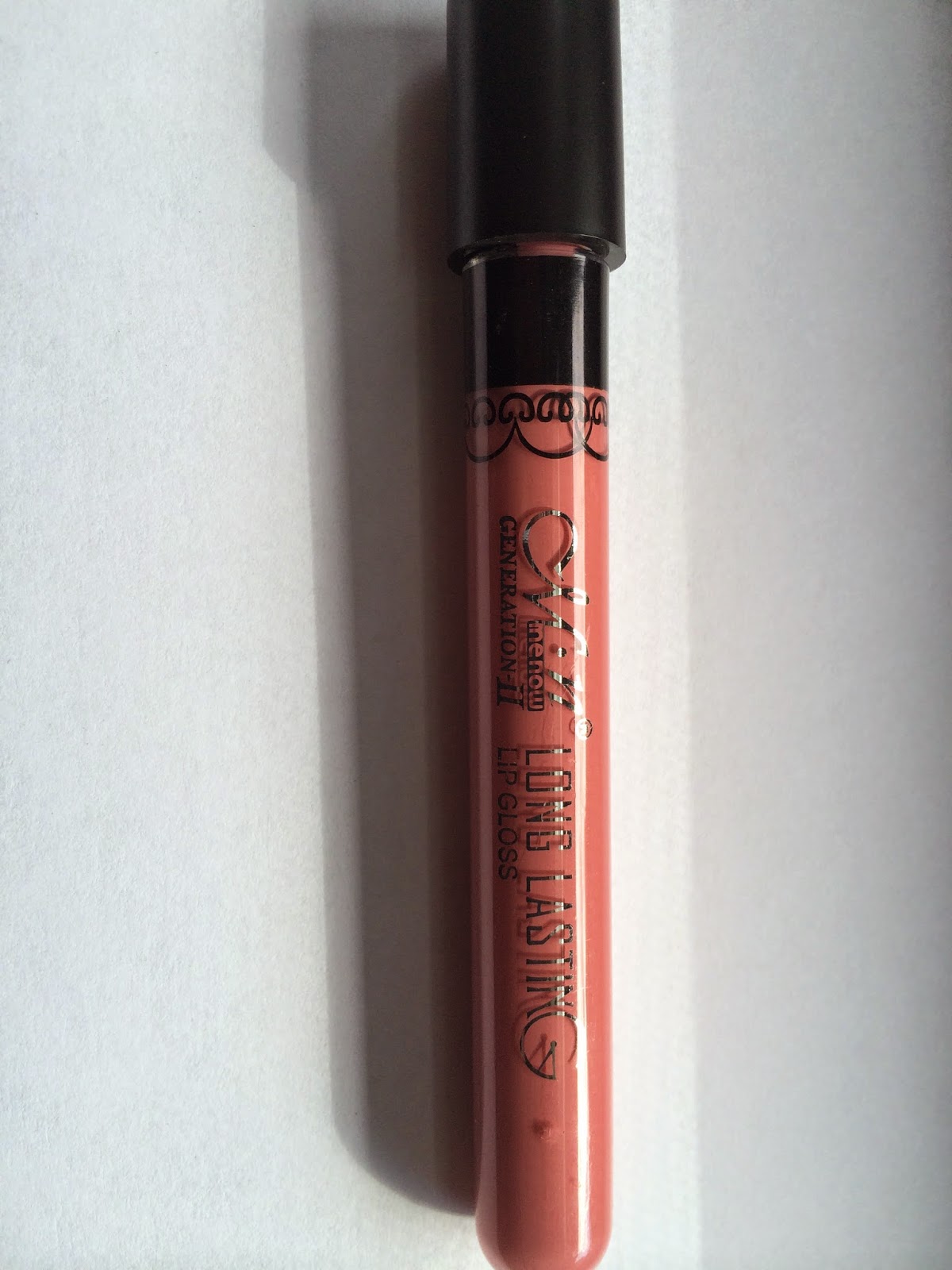 Review and Swatch Menow Generation II Long Lasting Lip Gloss in 03