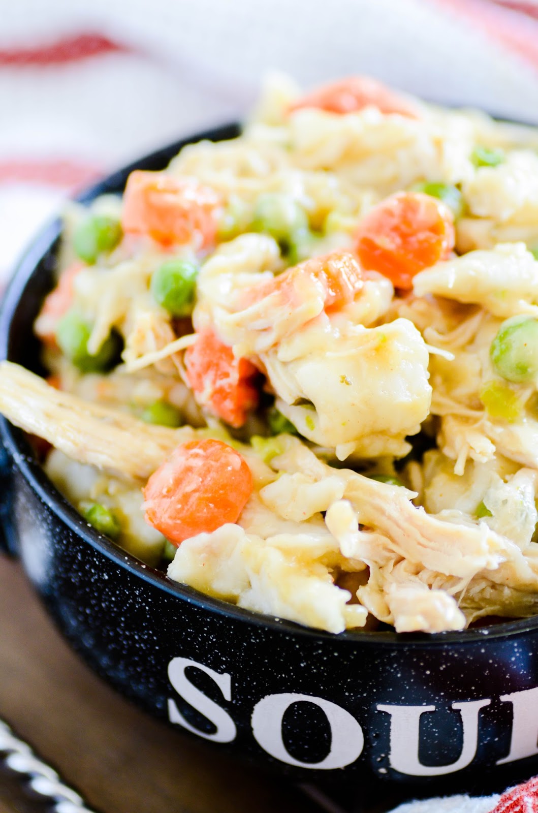 A quick and easy weeknight dinner of chicken and dumplings that the whole family will love.