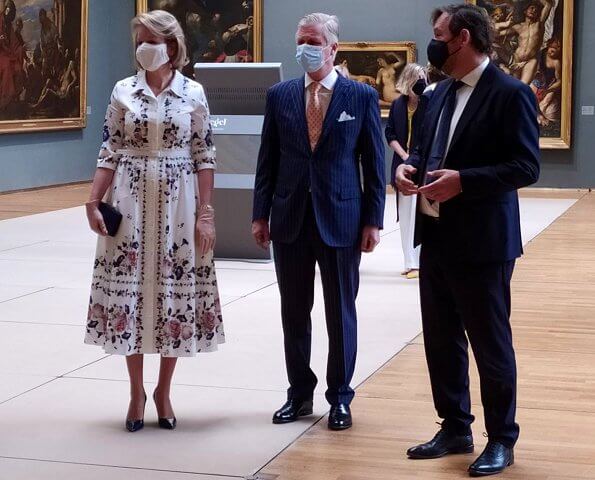 During her visit to the Old Masters Museum, Queen Mathilde wore a new floral print cotton shirt dress by Erdem