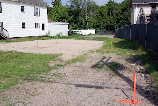 empty lot going to be expanded parking for the Oteri Funeral Home