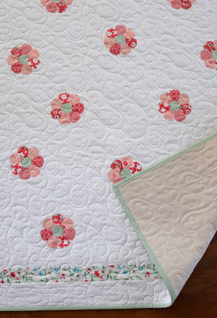 Sweet Daisy baby quilt by Andy of A Bright Corner.  Quilt pattern from A Stitch In Time english paper piecing book by Sharon Burgess