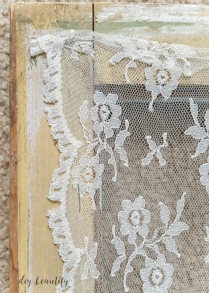 staple lace to window
