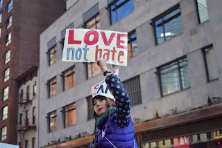 love not hate protest sign