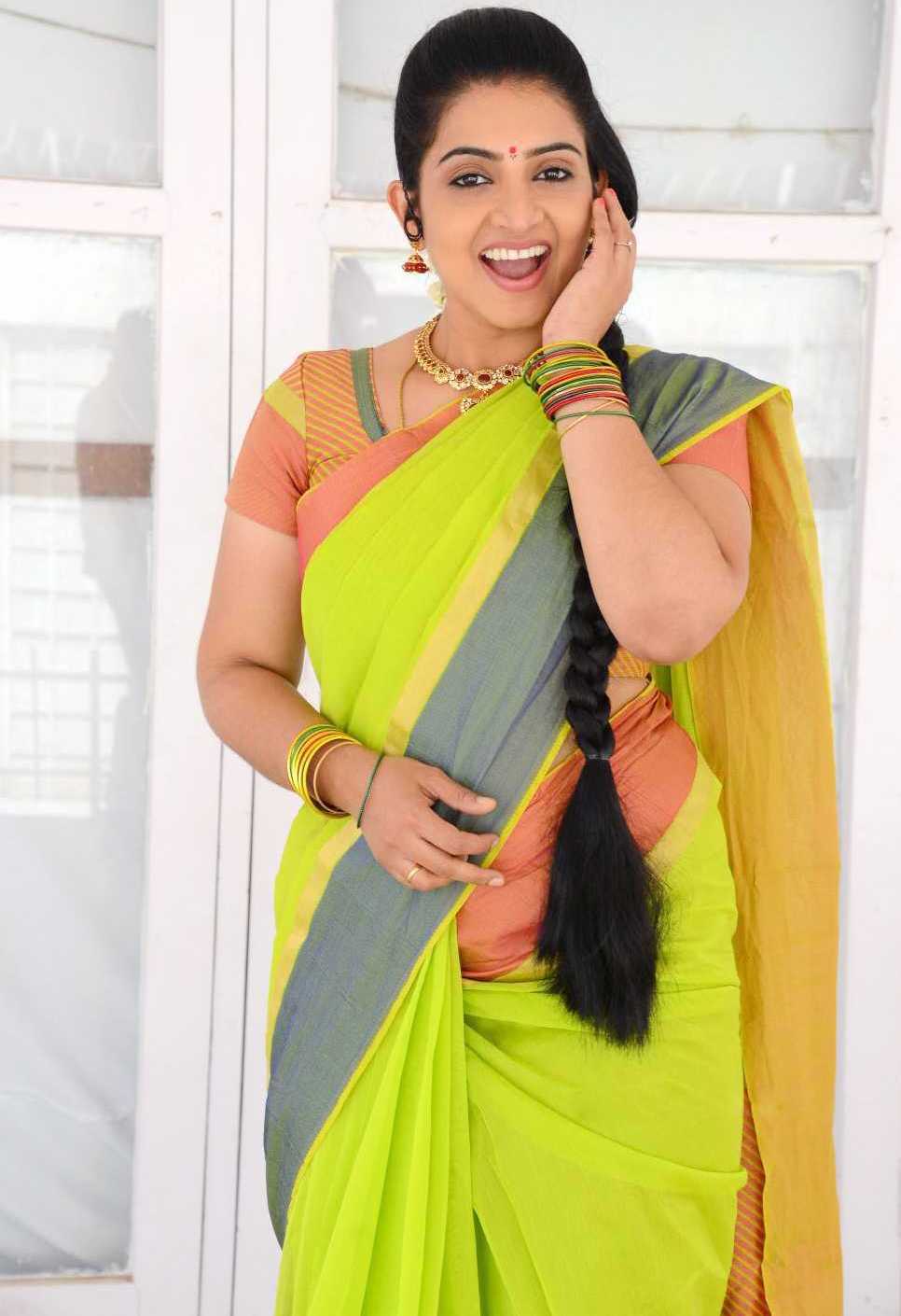 Telugu Tv Actress Sujitha Photos In Yellow Saree