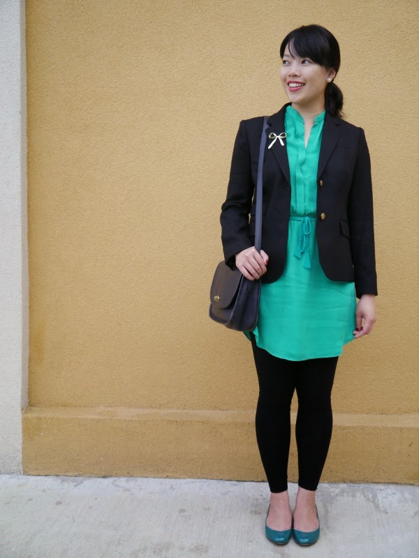 Vancouver blogger Lisa Wong of Solo Lisa wears a black J. Crew schoolboy blazer, emerald green J. Crew 'Janey' flats, emerald Aritzia Babaton silk tunic, Forever 21 black leggings and gold bow brooch, Maison Birks pearl earrings, and a navy blue vintage Coach bag.
