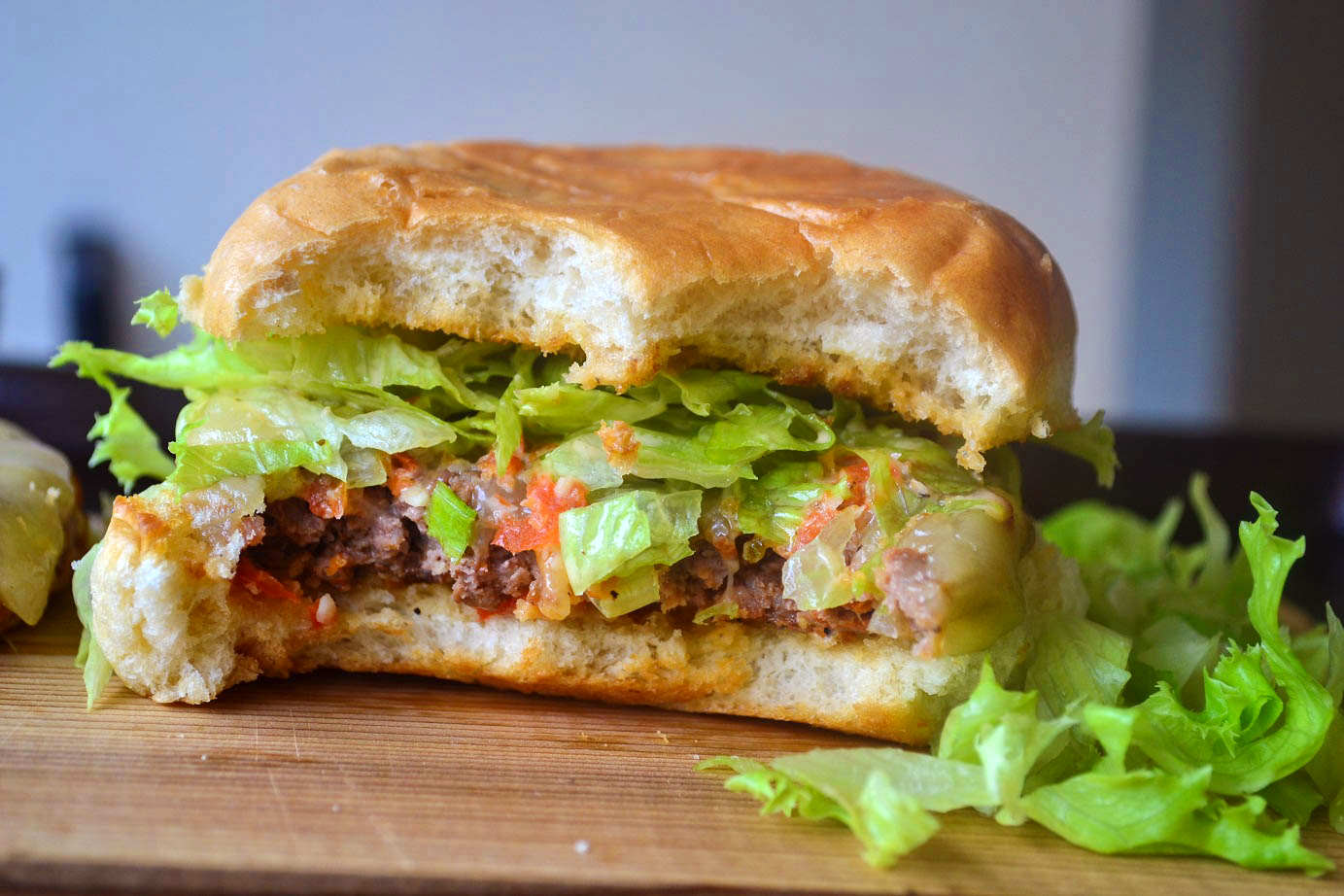 Greedy Girl Jerk sausage beef burgers with a roasted red pepper mayo