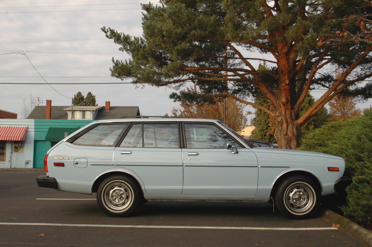 OLD PARKED CARS.: 1980 Datsun 210.