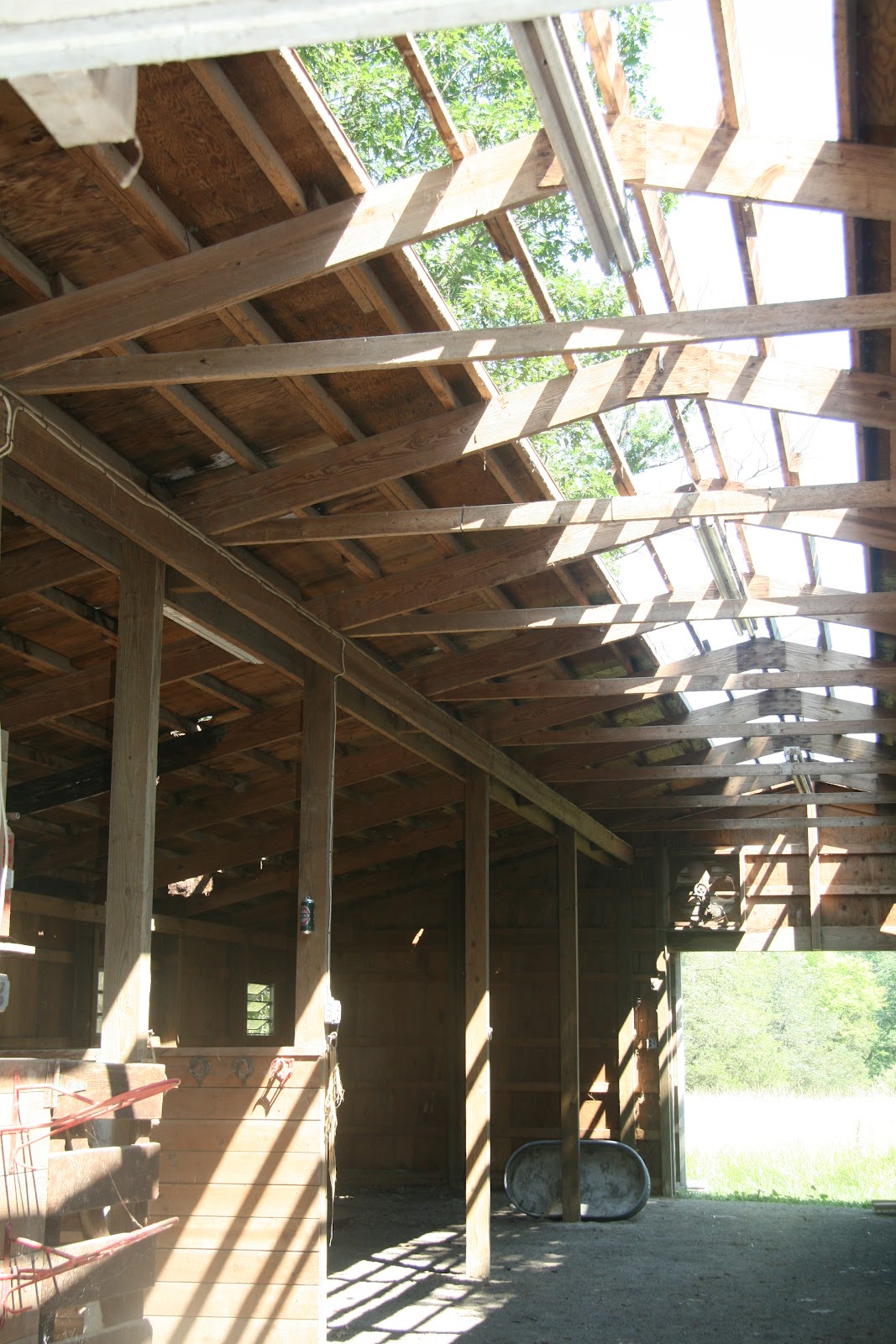 An Old Farm Repairing a Barn Roof