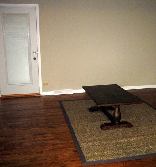 Our living room before we got our Macy's Devon Sectional Sofa. Without the couch our coffee table was oh-so-lonely. 