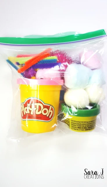 Make a Troll kit includes a FREE printable bag topper for you.  Add some playdough, cotton balls and decorations and you are ready to make some trolls.  Makes the perfect troll themed birthday goody bag.