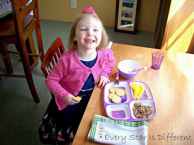 Sunshine enjoying her Montessori weaning table on Easter