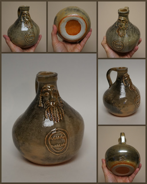 Beautiful pottery Bartmann or Bellarmine jug (replica) by Lily L.