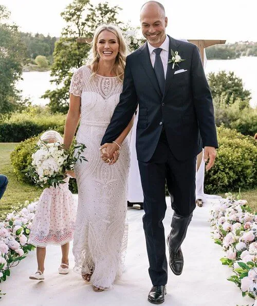 Andrea Brodin wore a wedding gown from By Malina. Princess Victoria wore a pleated dress from HM Conscious Exclusive. Elie Saab and Kreuger
