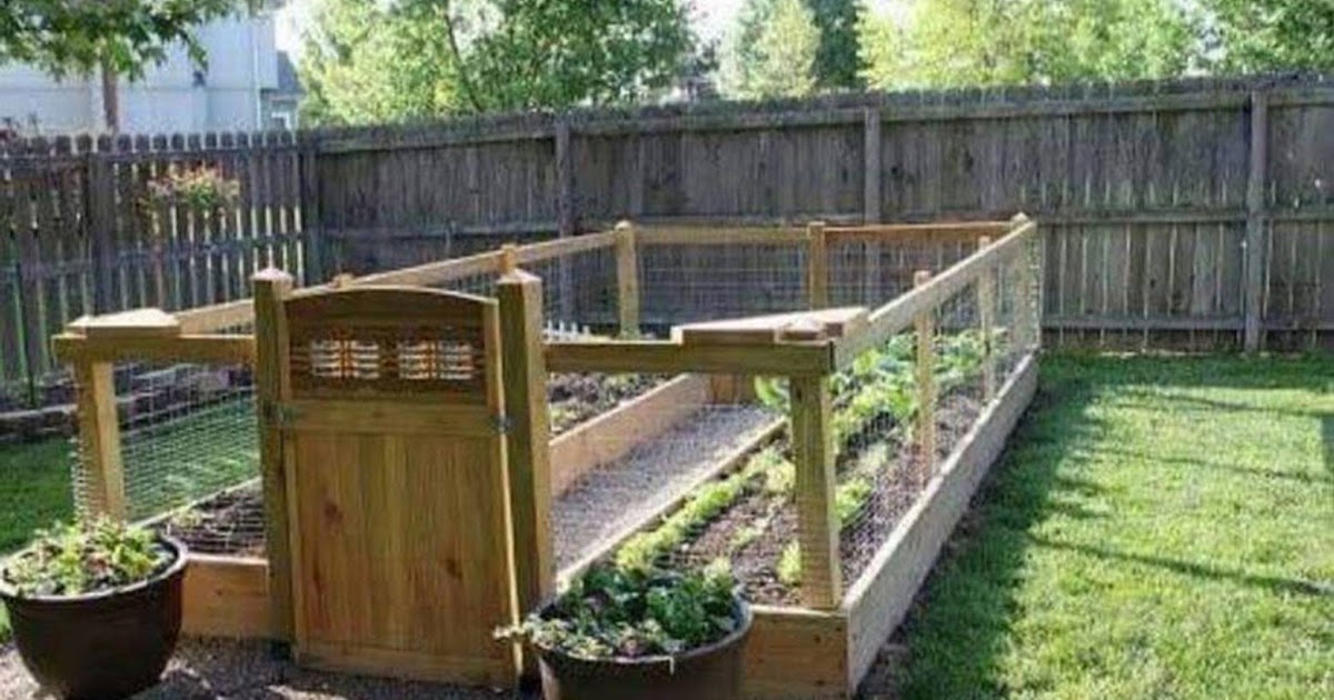 A Little Bit of This, That, and Everything Gated Garden Made From Pallets