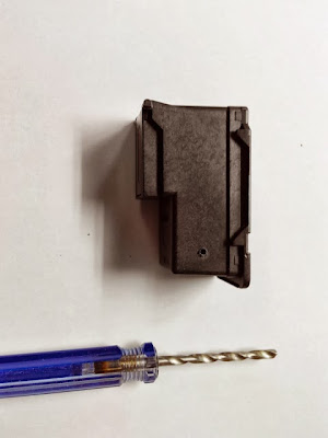 hacer una perforación para conectar las mangueras del sistema continuo de tinta