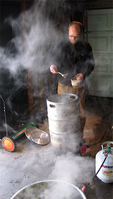 Nathan in action, skimming the wort for one of our soleras.