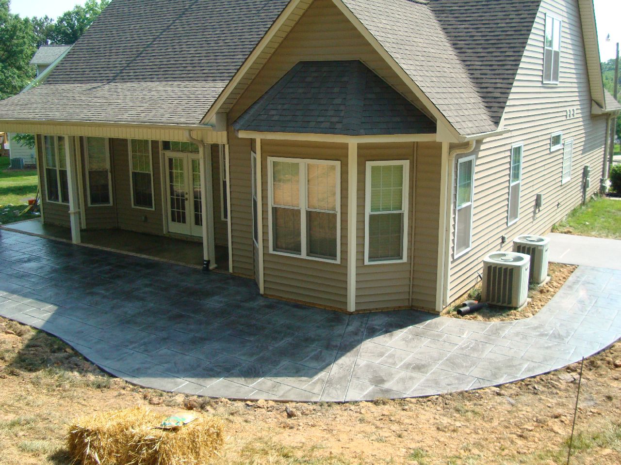 Atlantic Coast Concrete Stained Porch and Stamped Patio in French Grey