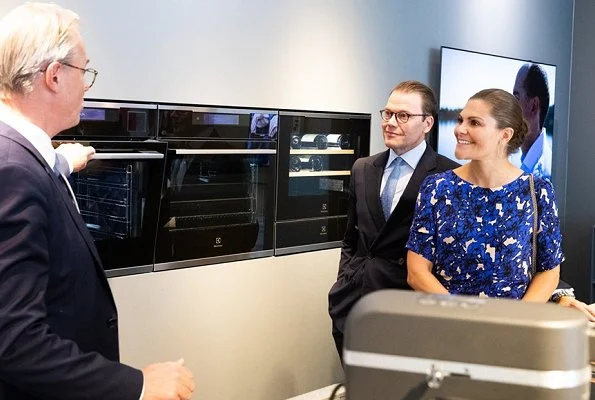 Crown Princess Victoria wore a blue print midi dress from Rodebjer. Electrolux Company which celebrates 100th anniversary of its establishment