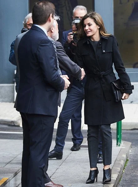 Queen Letizia wore Hugo BossJadela Stretch Virgin Wool Asymmetrical Blazer, ankle boots and carried clutch