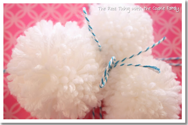 Gift wrap idea using adorable pom poms. #GiftWrap #Gifts #PomPoms #RealCoake