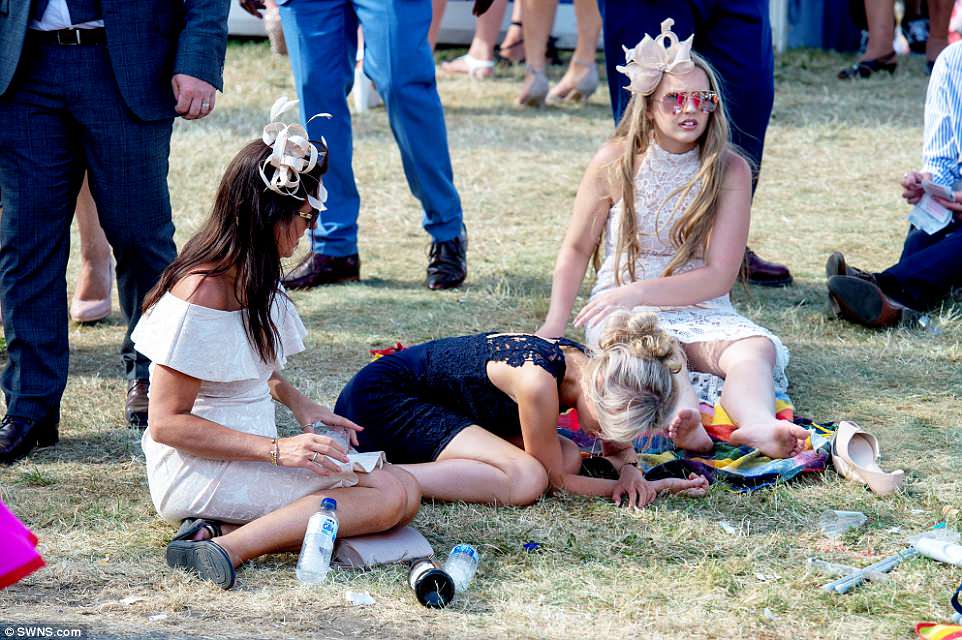 More very drunk ladies and young women who have over-indulged at the races....