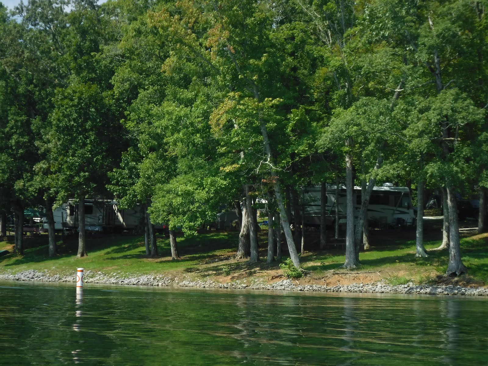 The ShoreXplorers Camping On a Lake Under the Eclipse Totality