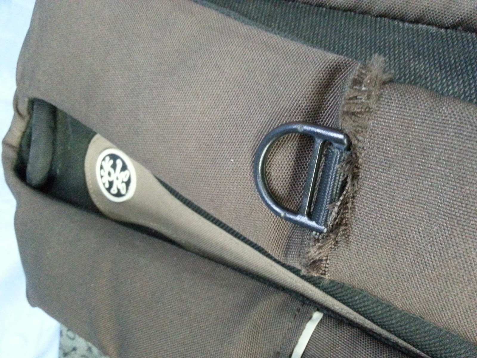 Crumpler bag repair, luggage wheel replacement, backpack stitching