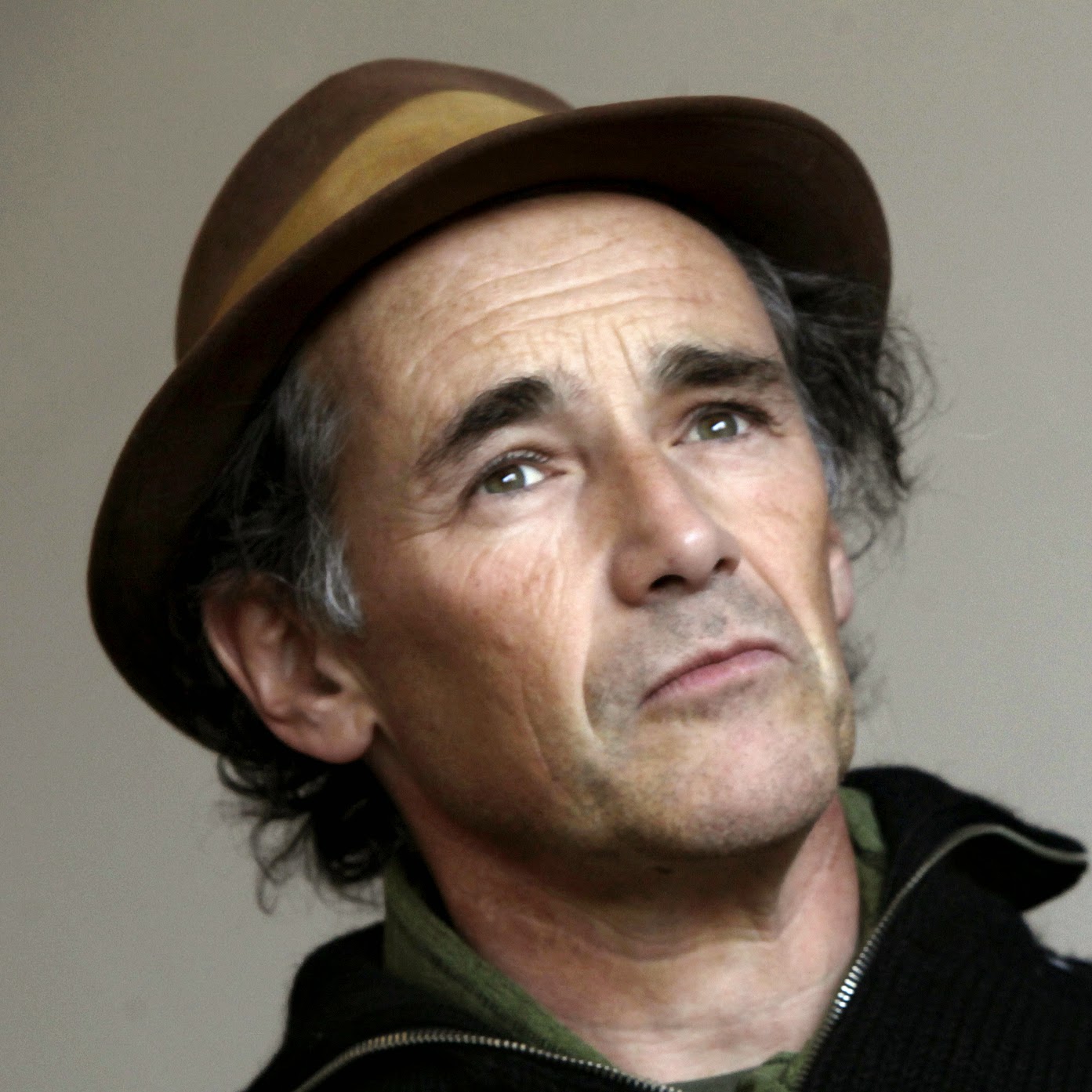 narrow brimmed hat with dented crown crossword