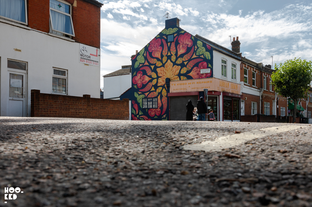 Street view of the full mural painted by US artist Beau Stanton in Walthamstow, London