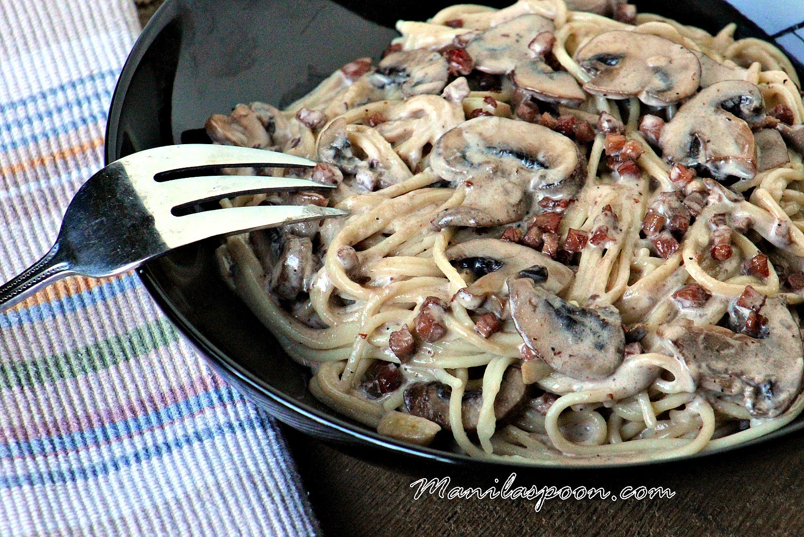 You can never go wrong with bacon and mushrooms! This creamy and delicious pasta with pancetta is our comfort food for sure.