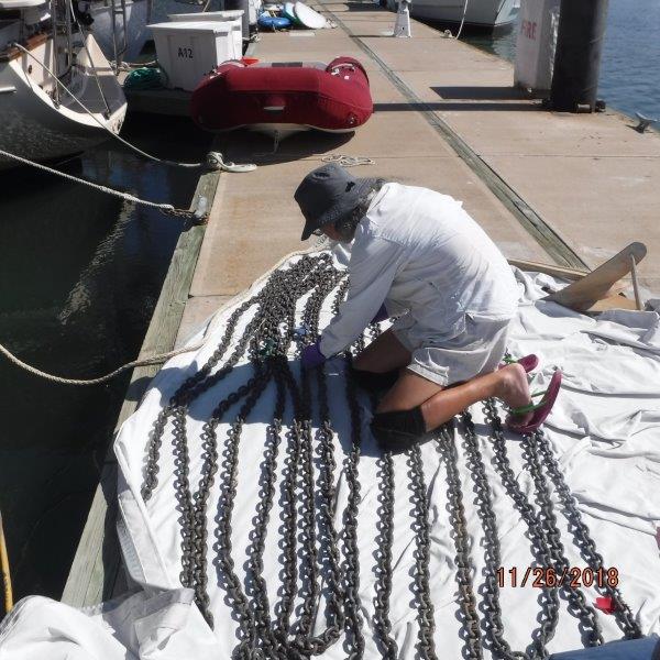 Chip & Debbie Willis on s\v Elegant'sea Marking our anchor chain with