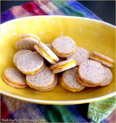 Lemon Filled Poppy Shortbread Cookies, a melt in your mouth sandwich cookie bursting with flavor | Recipe developed by www.BakingInATornado.com | #recipe #lemon #cookies