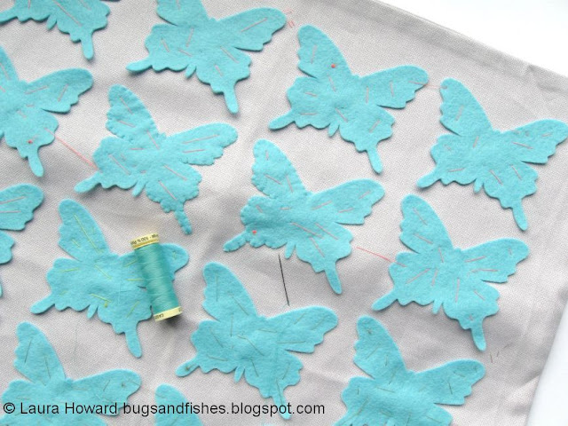 DIY Felt Butterfly Cushion Tutorial sewing the felt butterflies to the cushion cover