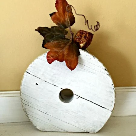 pumpkin with a stem and a leaf