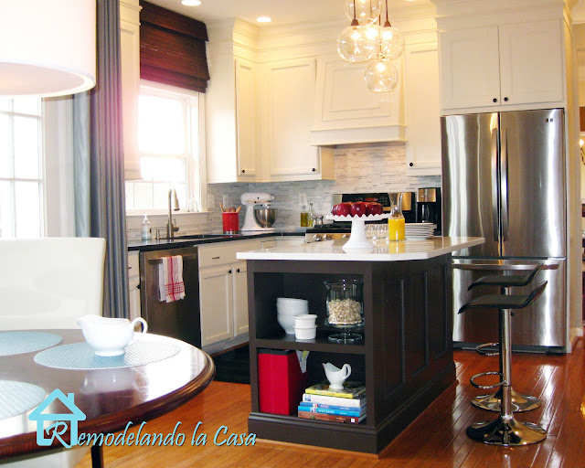 kitchen makeover with swivel chairs, bookshelf, table, lights
