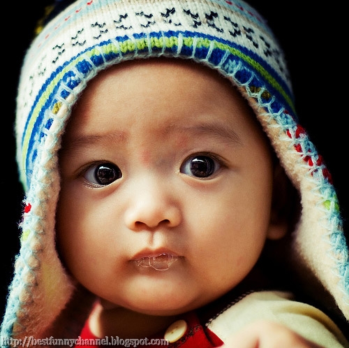 Very cute baby in the cap