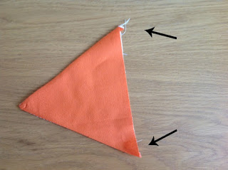 triangle with arrows showing what to cut off