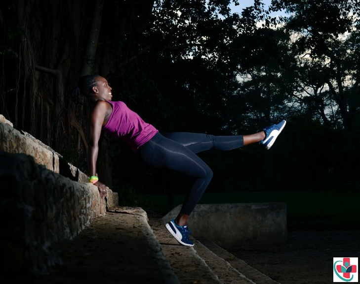Woman exercising at night