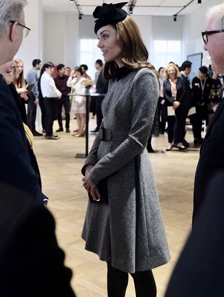 Kate Middleton is wearing a grey Catherine Walker dress and the Lock and Co hat