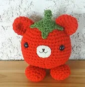 http://www.ravelry.com/patterns/library/kawaii-tomato-bear