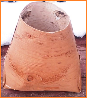 Smooth basket made of birch bark.  Possible leak points: bottom corners, where the bark was folded in.