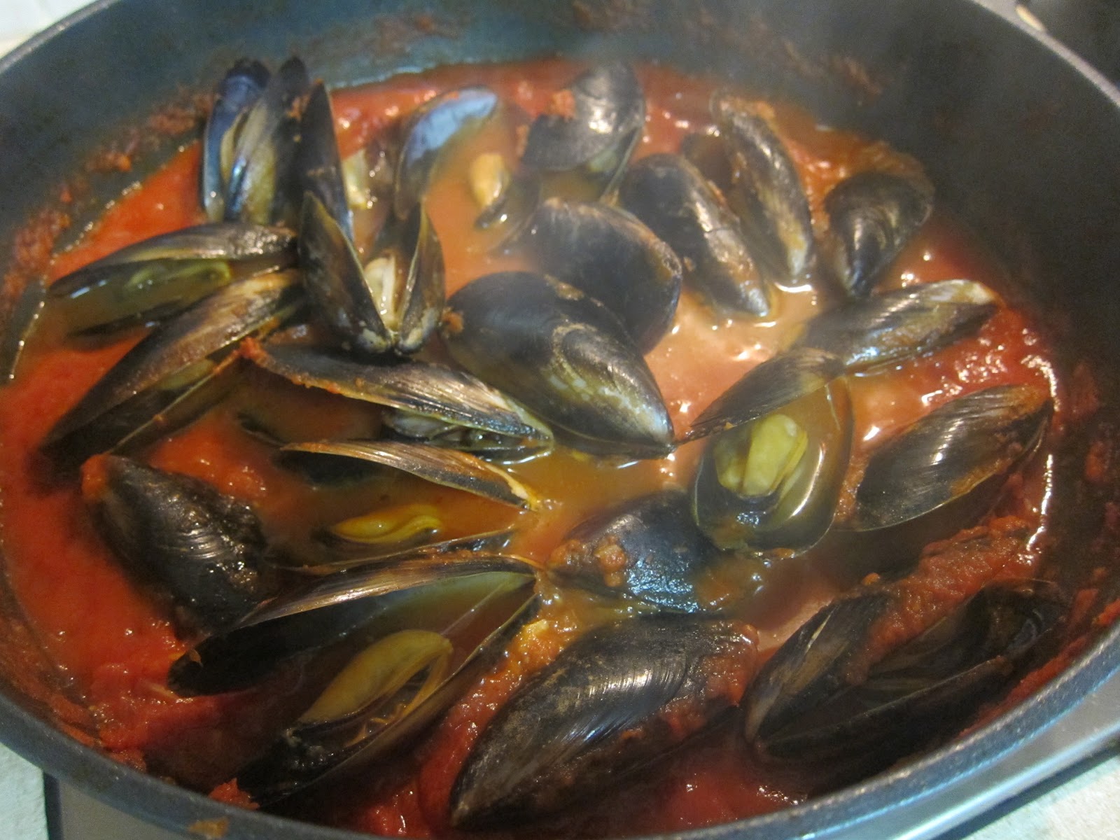 Saucy Thyme Braised Mussels with Tomato, Chilli and Basil