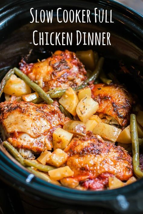 This Slow Cooker Full Chicken Dinner has tender chicken thighs, Yukon gold potatoes and green beans in a savory herb sauce.