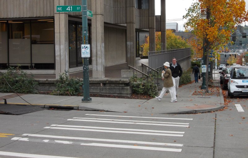 A decorative wall blocking the direct route