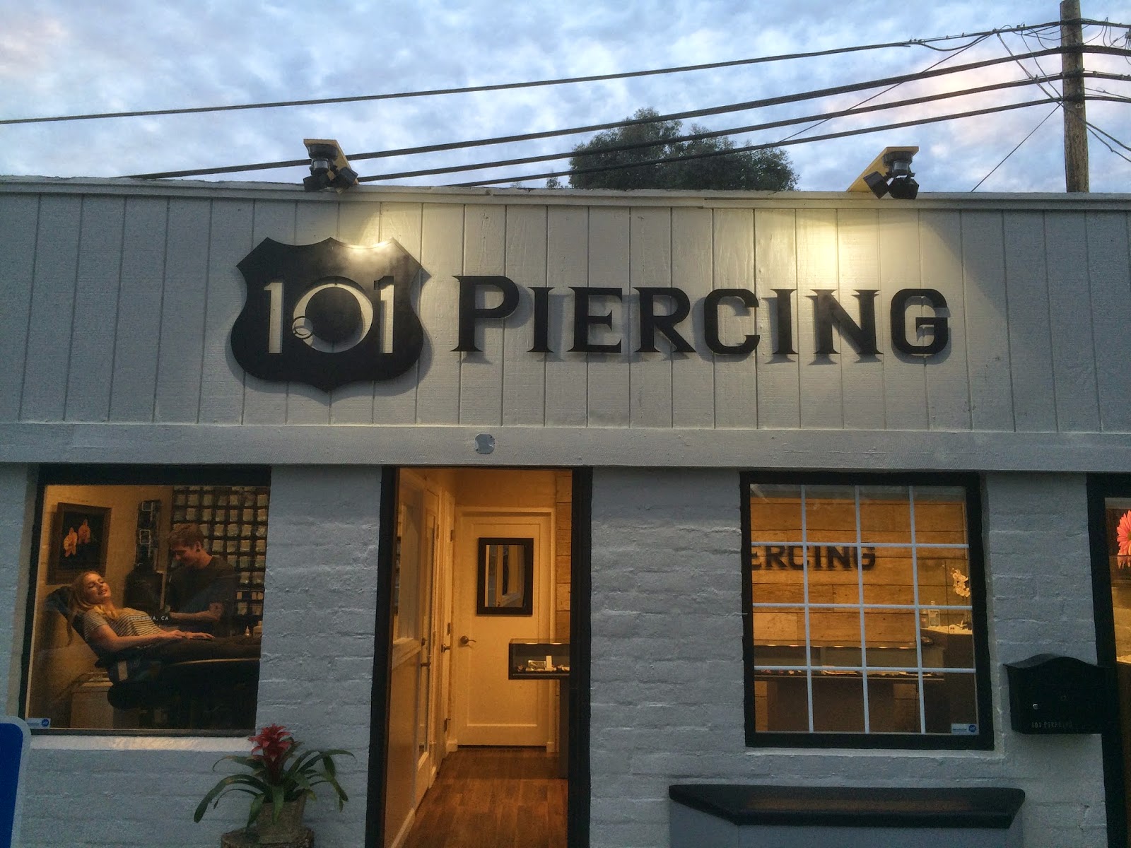 Graphic Design by Jamison 101 Piercing Logo & Shop Signage