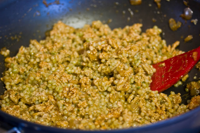 Couscous cooking in a saute pan