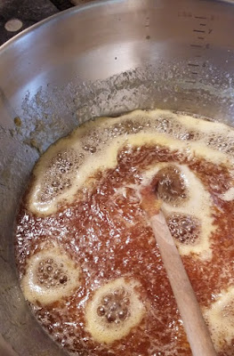 Picture of marmalade boiling in a saucepan, when I made quick and easy home-made marmalade from MaMade