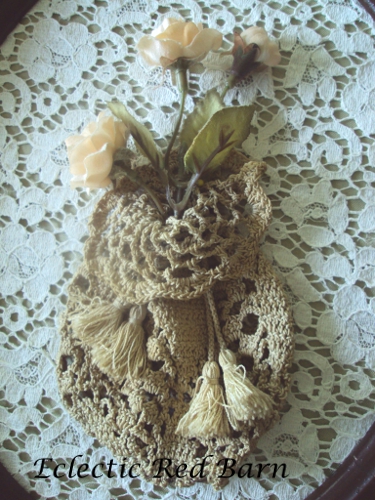 Vintage crocheted purse with silk flowers