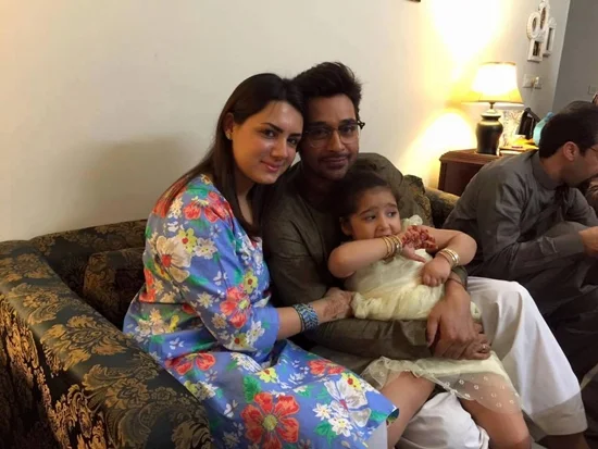 Faisal Qureshi with his wife and daughter